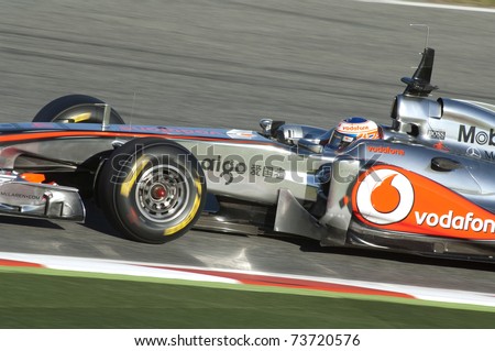 BARCELONA, SPAIN - FEBRUARY 18: Jenson Button drives for the McLaren team during testing at the Circuit de Catalunya February 18, 2011 in Barcelona, Spain.