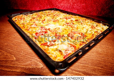 A pan of pizza on a table