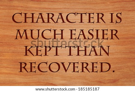 Character is much easier kept than recovered - quote by Thomas Paine on wooden red oak background