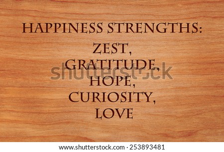 Happiness strengths - zest, gratitude, hope, curiosity, love - list of character strengths for recipe of happiness - on wooden background