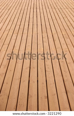Wooden planks floor fading away to the horizon