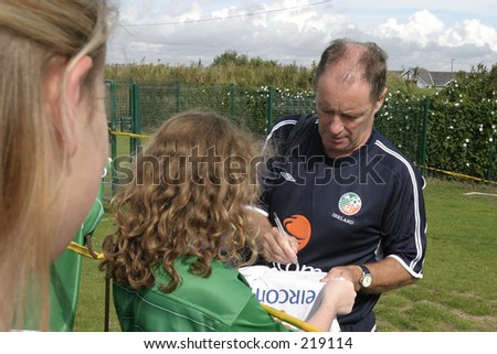 Brian Kerr, Ireland Football Manager, signs autographs ahead of a squad training session. Malahide, Co. Dublin