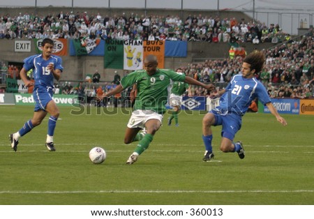 Clinton Morrison shoots past Saban Klemi.Ireland V Israel,World Cup Qualifier, 04 June 2005,Lansdowne Road,Dublin.