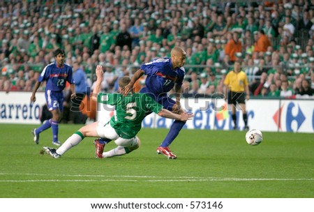 Richard Dunne tackles Thierry Henry. Ireland V France,World Cup Qualifier, 7 September 2005, Lansdowne Road Dublin. France won 1-0.