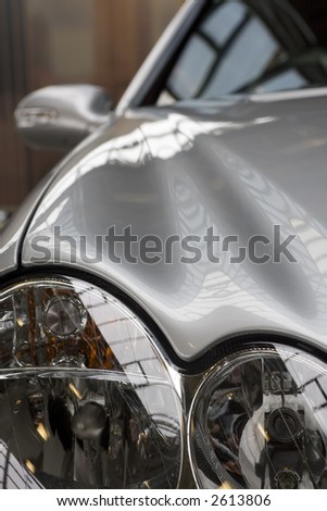 Close up on the headlamps of an expensive German saloon car