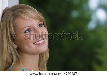 A naturally pretty young woman looking happy
