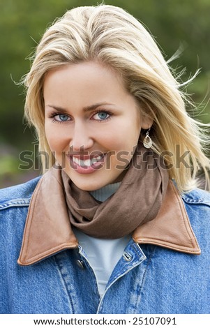 A naturally beautiful young blond woman shot outside in natural light