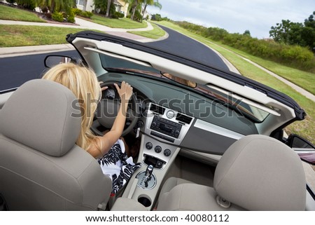 Kafi "MAJEVICA" - Page 10 Stock-photo-rear-view-of-a-beautiful-young-blond-woman-driving-her-convertible-car-40080112