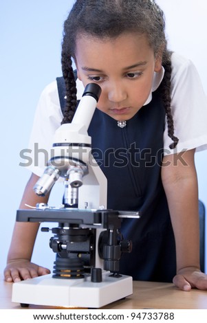 Child Using Microscope