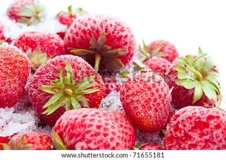 Closeup of frozen strawberries isolated on white