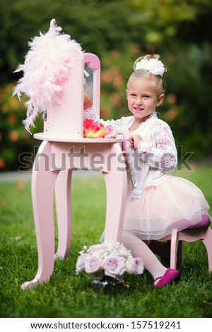 portrait of a little fashion ballerina outdoor