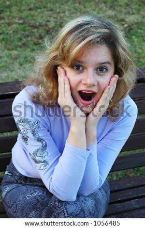 Attractive girl with amazed expression