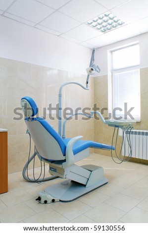 Interior of a dental clinic , dental chair and equipment