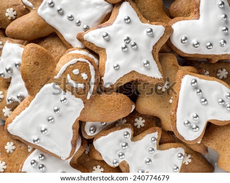 Background of assorted shapes of christmas gingerbread cakes
