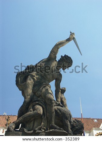 Sculpture representing allegory of good and evil fight