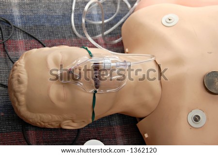 First-aid training dummy with respiratory mask