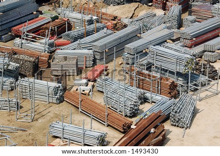 Storage yard at construction site with scaffolding components