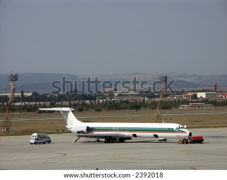 Passenger airplane being checked at the airport before flight