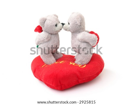 two teddy bears kissing