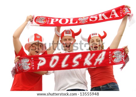 Three young Polish soccer fans dressed in Polish national color t-shirts, caps and scarfs cheering on over white background