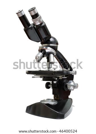 Old microscope shot over white background