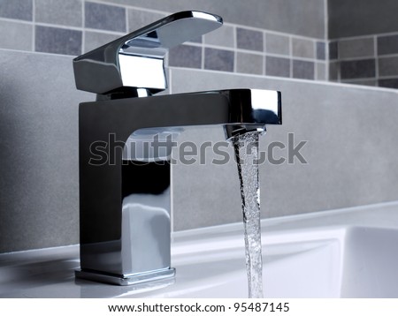 Modern Bathroom Faucets on Modern Bathroom Chrome Faucet With Running Water Stock Photo 95487145