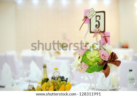 wedding table decoration with flower composition