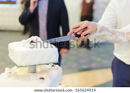 big knife ready to cut wedding cake