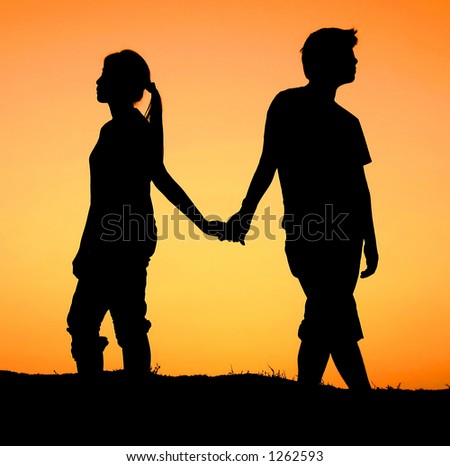 stock photo : couple holding hands during sunset