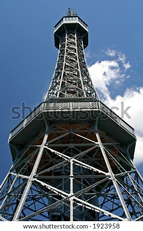 A steel tower with sky as background