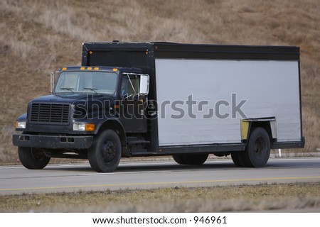 Beer Truck on the highway with white side for message or product