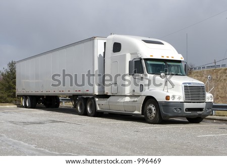 stock-photo-white-tractor-trailer-semi-truck-996469.jpg