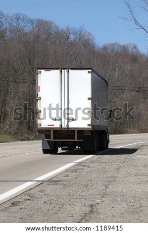 Rear View of a Semi Truck on the Road