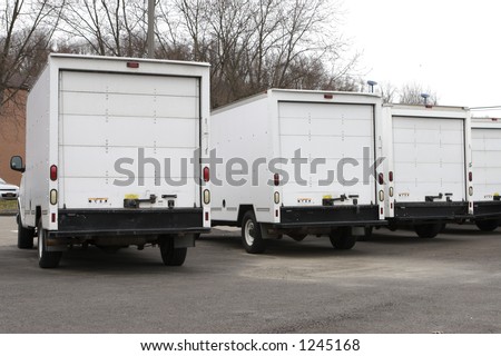 Three New Box Delivery or Moving Trucks