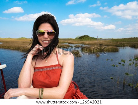 Beautiful woman enjoying the outdoors in the Florida Everglades.