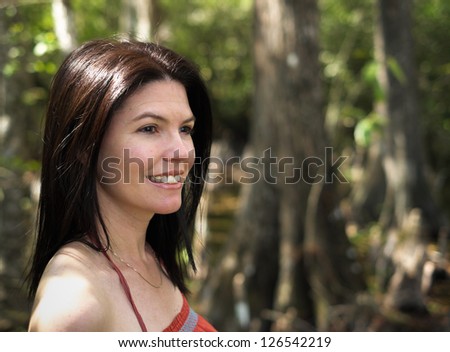 Beautiful woman enjoying the outdoors in the Florida Everglades.
