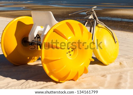 Gulf coast beach in Biloxi, Mississippi with a water tricycle.