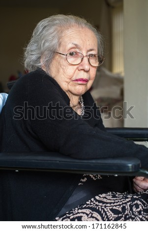 Elderly eighty plus year old woman portrait in a home setting.