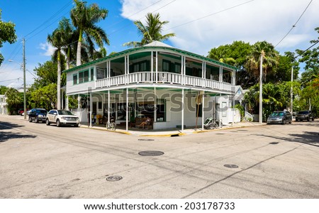 KEY WEST, FLORIDA USA - JUNE 26, 2014: A typical Key West street corner in the historical district with neighborhood restaurant.