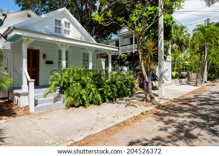 KEY WEST, FLORIDA USA - JUNE 26, 2014: A beautifully restored vintage home in the residential Historic District of Key West.