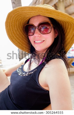 Pretty middle age woman enjoying beautiful Miami Beach.