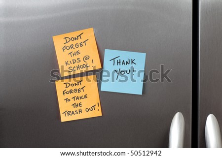 Sticky Notes on a Kitchen Refrigerator