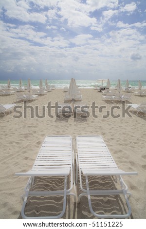 Beach Lounge Chairs and Umbrellas