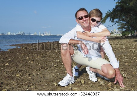 Father and Son lifestyle image along Miami\'s Biscayne Bay shoreline.