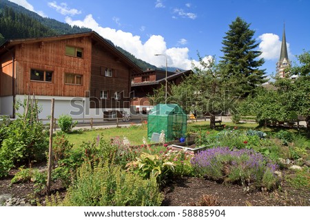 Swiss Alps - Typical landscape view of a small Swiss mountain and farming village located in the Prattigau Valley of the city of Kublis in the Graubunden canton of Switzerland.