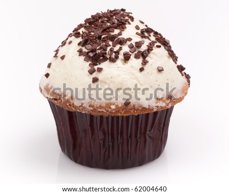 Gourmet vanilla butter cream cupcake with chocolate sprinkles on a white background.