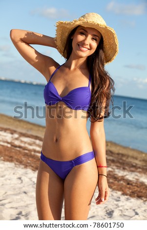 Beautiful young woman at the beach in Miami