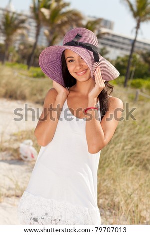 Beautiful young woman enjoying South Beach in Miami.