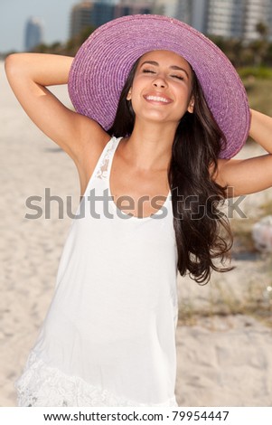 Beautiful young woman enjoying South Beach in Miami.