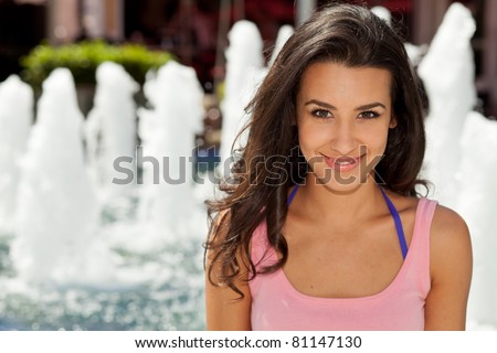 Beautiful young woman outdoor in Miami Beach Lincoln Road Mall.